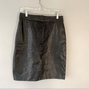 80’s high waisted leather skirt!. Cut above the knee and a lil sexy slit.